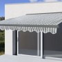 MCW Kassettenmarkise 4x3m, grau/weiß gestreift mit Volant, am Haus montiert.