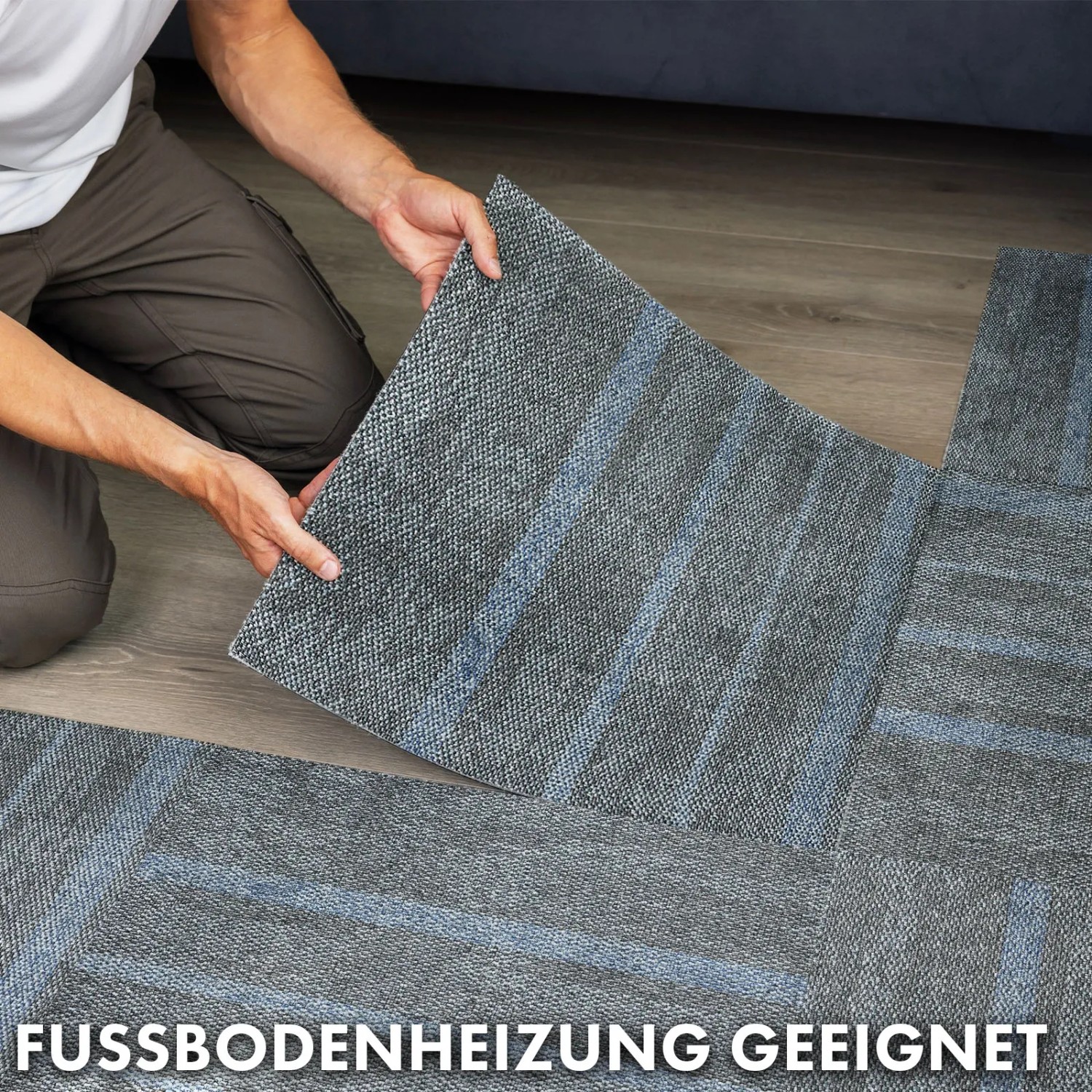 Verlegen von blauen Floordirekt Teppichfliesen Zürich 50x50 cm, schalldämmend und selbstliegend.