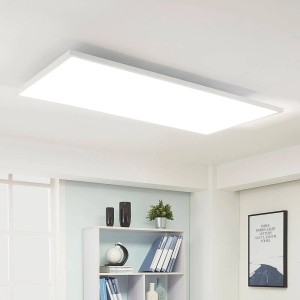 Weißes, dimmbares Arcchio LED Panel Arya mit Leselampe für das Arbeitszimmer.