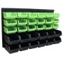 TRUTZHOLM Werkzeugschrank mit 32 Stapelboxen (18 grüne, 12 schwarze) und Wandregal.