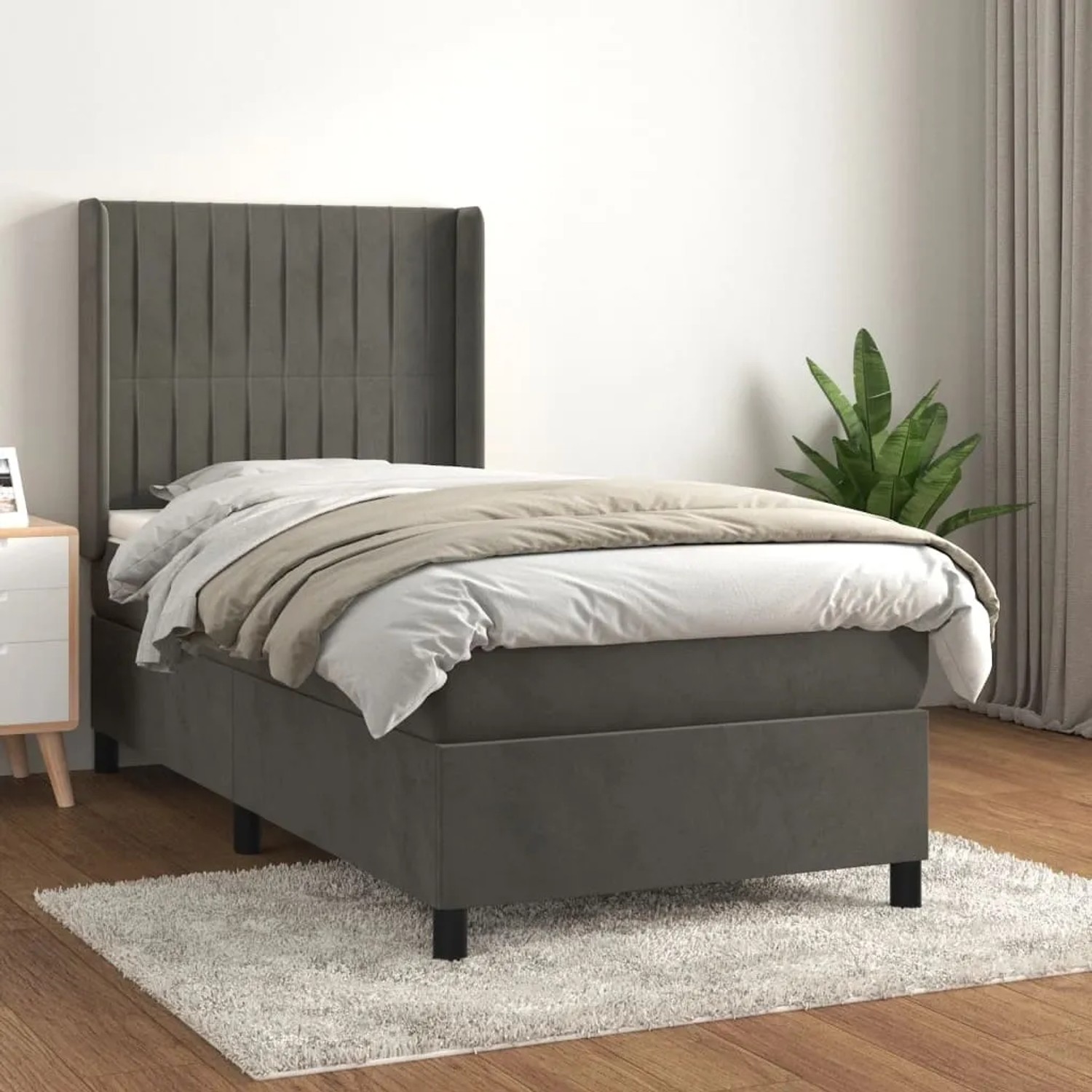Dunkelgraues Boxspringbett (80x200 cm) mit Matratze und Samtbezug.