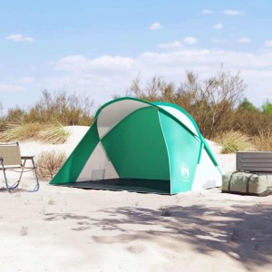 Meergrünes Pop-Up Strandzelt auf Sandstrand. Schneller Aufbau, idealer Sonnenschutz für 2 Personen beim Camping.