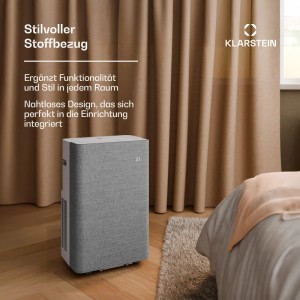 Klarstein AireLux Klimaanlage, hellgraues Design mit Textilfront, im Schlafzimmer.