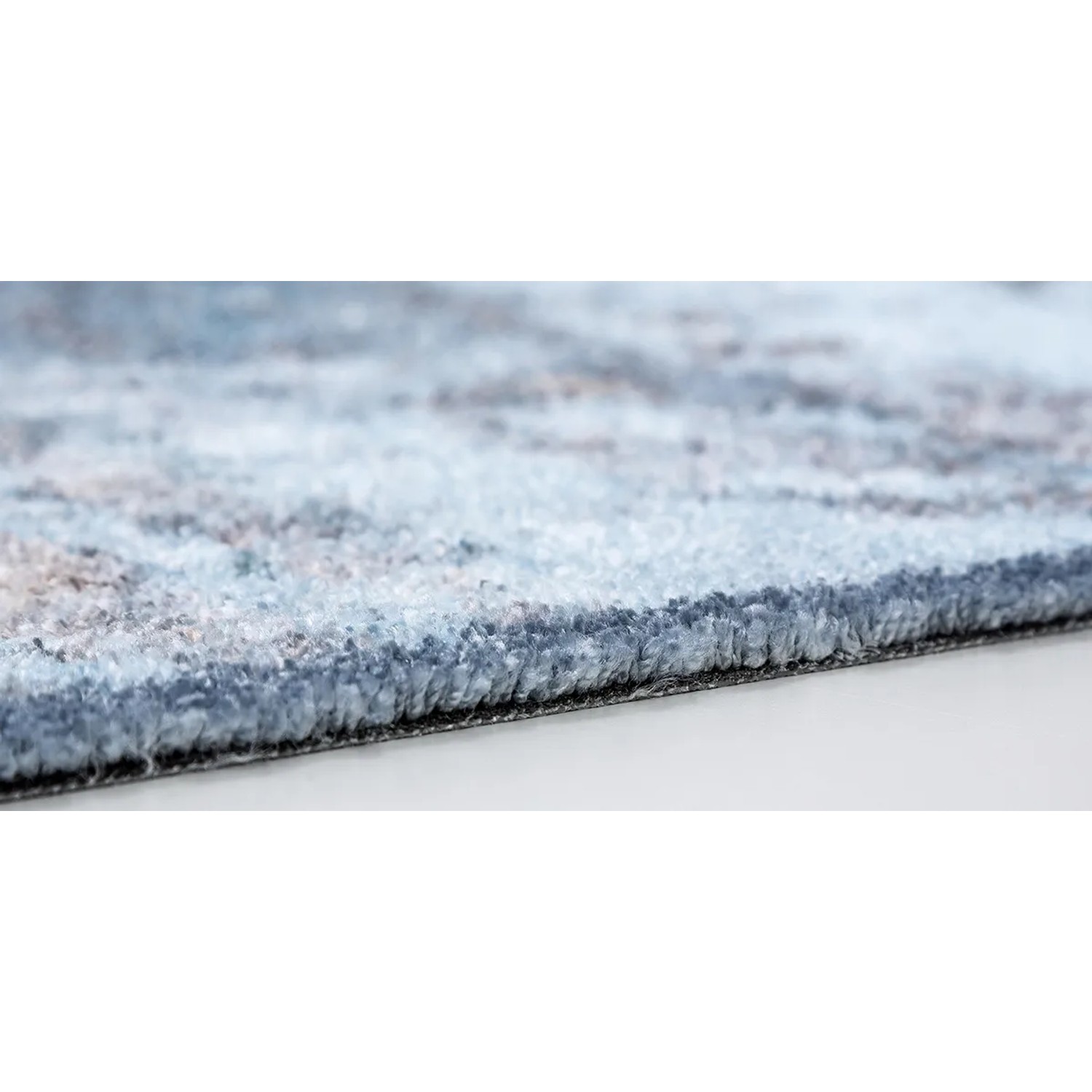 Astra Sauberlaufmatte Pure und Soft, 50x70 cm, Beton Hellblau, Detailansicht der Textur.