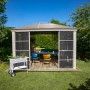 Sojag Pavillon Striano 10x12 Champagner mit Moskitonetz und Stahldach im Garten.