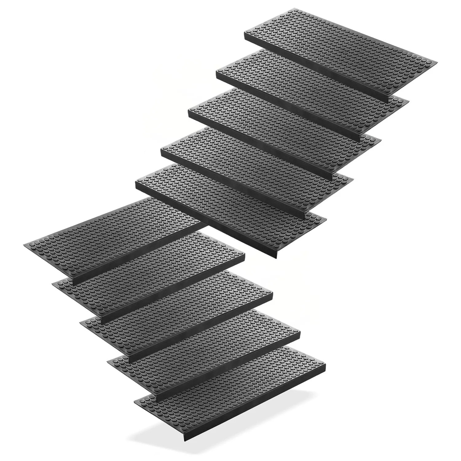 Zehn schwarze Gummi Stufenmatten mit Kreis Design für sicheren Anti-Rutsch-Halt auf Treppenstufen.