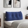 Polizeiblaues Samt-Rückenkissen mit Knopfheftung und Seitentasche auf einem Bett. Ideal für Komfort & Unterstützung.