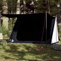 Dunkles Furnicato Campingzelt mit weißen Seiten und Sonnendach auf Wiese. Verdunkelnde Plane für erholsamen Schlaf im Outdoor-Bereich.