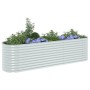 Silbernes furnicato Garten-Hochbeet aus verzinktem Stahl, bepflanzt mit Blumen und Kräutern.