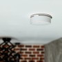 Weißer Shelly Rauchmelder Plus an Zimmerdecke, Hausautomation.