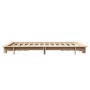 Massives Kiefernholz Bettgestell 120x190 cm mit Lattenrost. Unbehandeltes Holz, schlichtes Design, Seitenansicht.