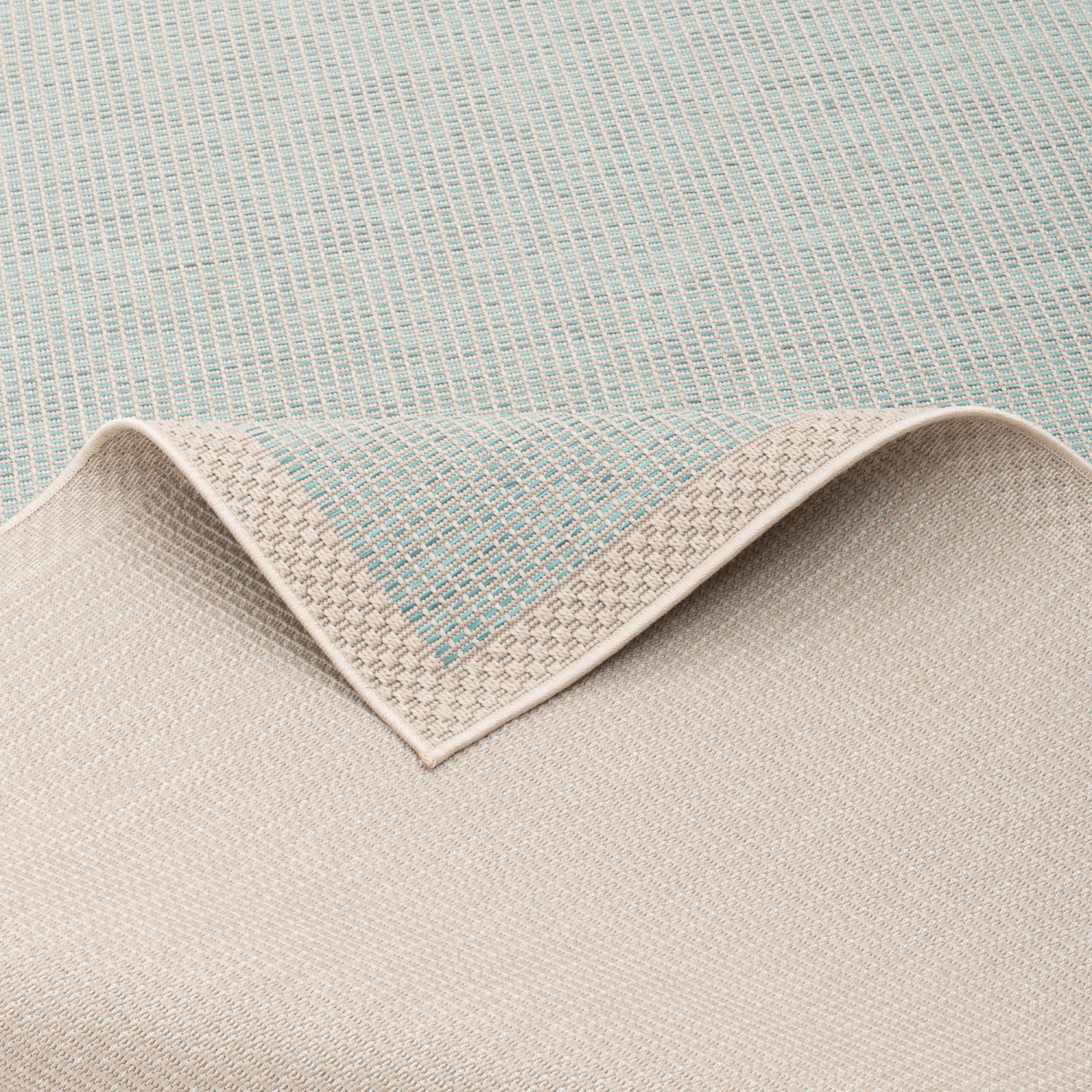 Türkiser Pergamon In & Outdoor Teppich Ottawa (160x230cm) mit Bordüre, geeignet für Innen- und Außenbereiche.