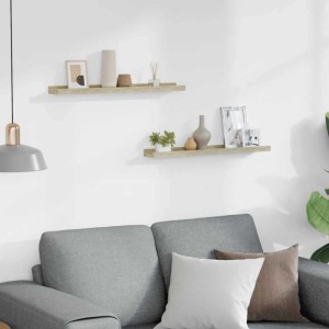 Zwei vidaXL Wandregale Sonoma-Eiche aus MDF, 60 cm, an weißer Wand über Sofa. Dekorative Ablage für Regale.