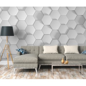Fototapete mit weißem Hexagon Muster an Wand hinter Couch und Lampe.