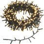 OBI LED Lichterkette für Außen mit 400 warmweißen LEDs und grünem Kabel, teilweise aufgerollt.