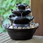 Dobar Design Zimmerbrunnen in Felsen-Optik, schwarz, mit Deko-Steinen. Entspannendes Wasserspiel für den Innenbereich.