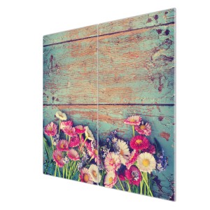 Banjado 2-teilige Herdabdeckplatte aus Glas mit Blumenmotiv auf blauem Holz.