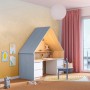 Kinderzimmer mit hafergelber Wandfarbe und Haus-Schreibtisch. CREATE! by OBI Lieblingsfarbe.