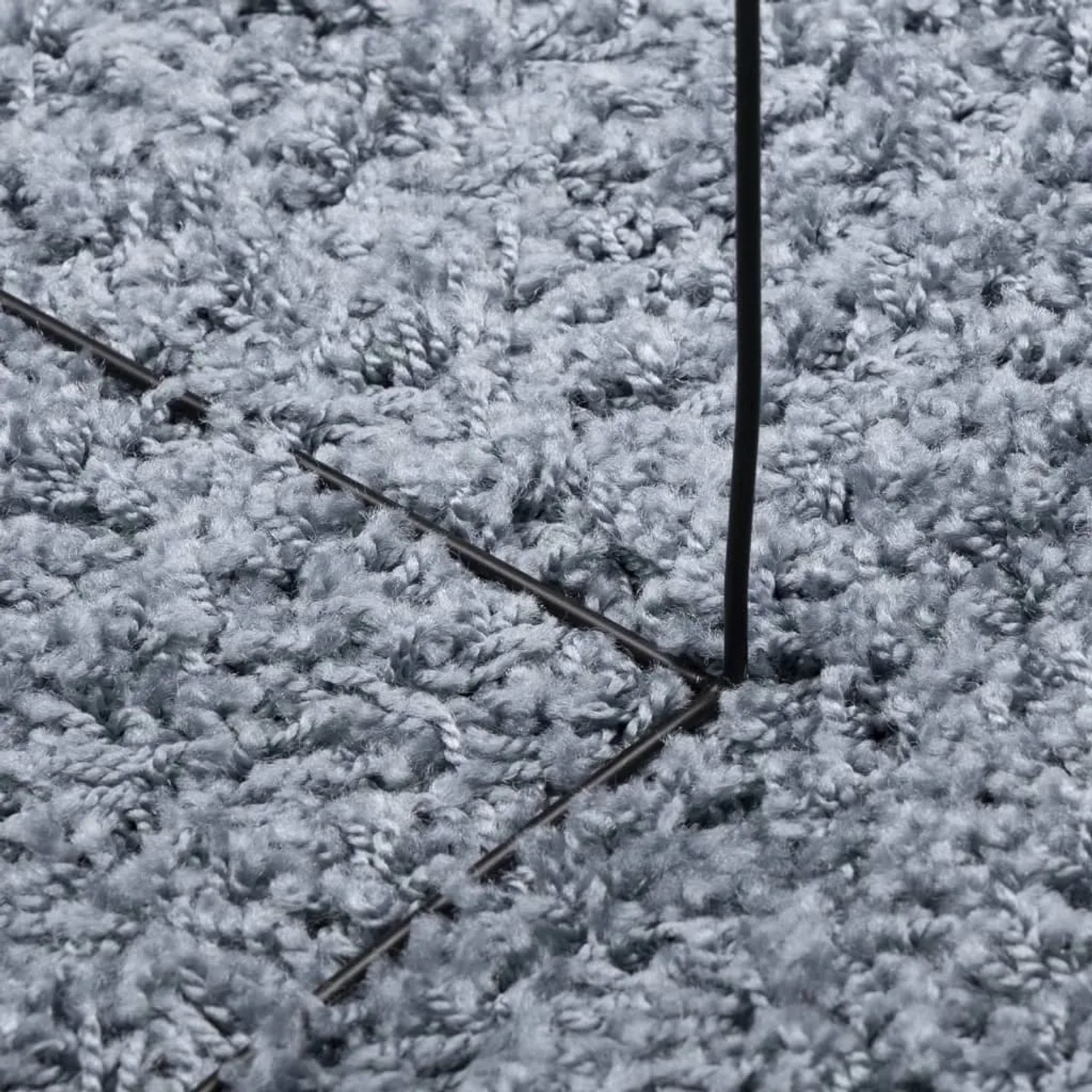 Detailansicht: Blauer Shaggy Teppich (200 cm) mit hohem Flor.