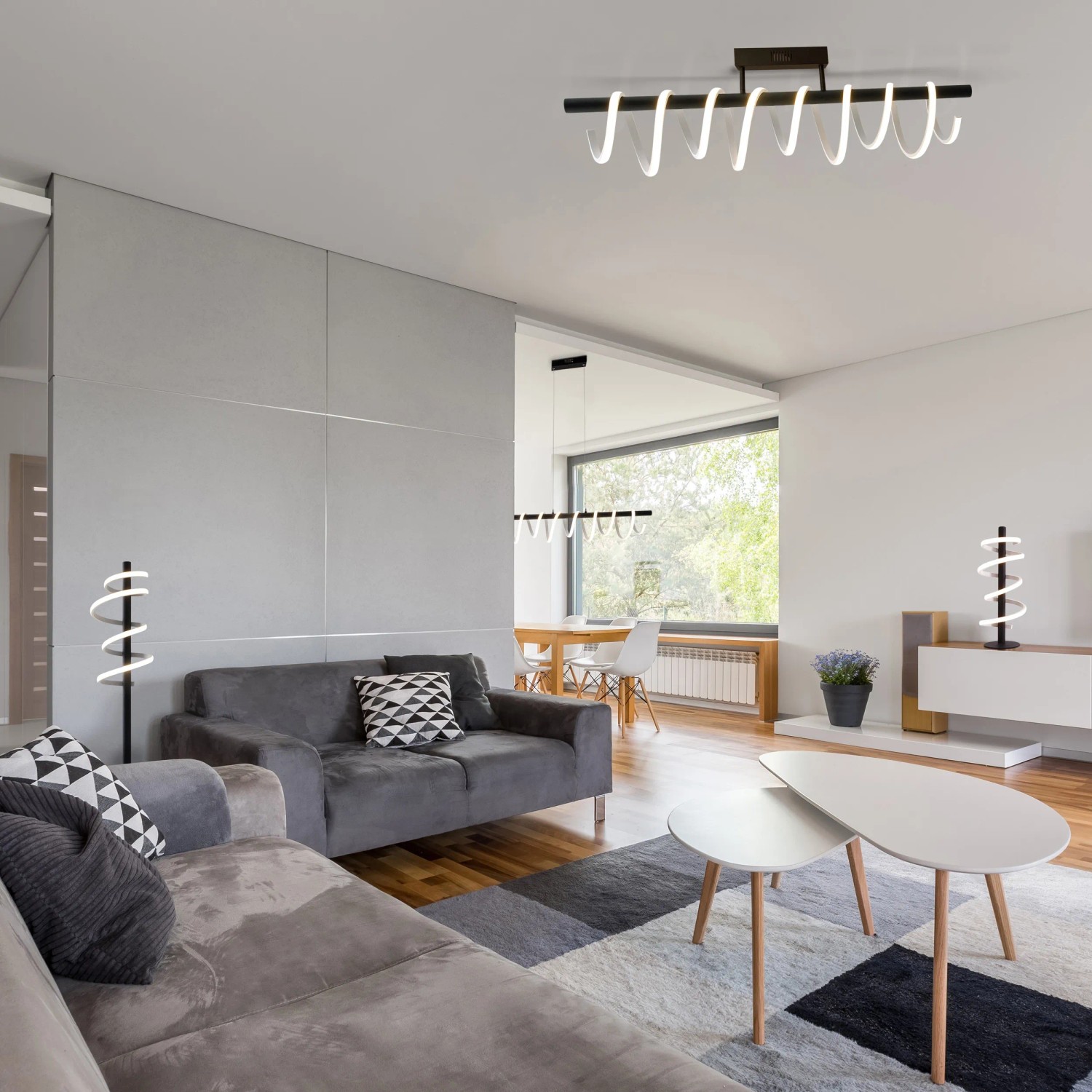Moderne LED Stehleuchte Belleza von Näve, 140 cm hoch, spiralförmiges Design, warmweißes Licht im Wohnraum.