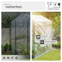 Tectake Foliengewächshaus Andrea mit 4 Regalebenen, transparent/weiß, im Garten.