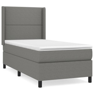 Boxspringbett dunkelgrau 90x200 cm mit Matratze und Kopfteil aus Stoff.