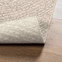 Cremefarbener ZIZUR Outdoor-Teppich in Jute-Optik, gewebt, auf Holz. Robuster Polypropylen Teppich für Innen & Außen.