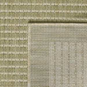 Detailansicht des grünen Ayyildiz Outdoor-Teppichs Giza 1410 (140x200 cm) in Sisal-Optik.