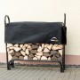 Schwarzes ShelterLogic Kaminholzregal mit Abdeckung, befüllt mit Holz.