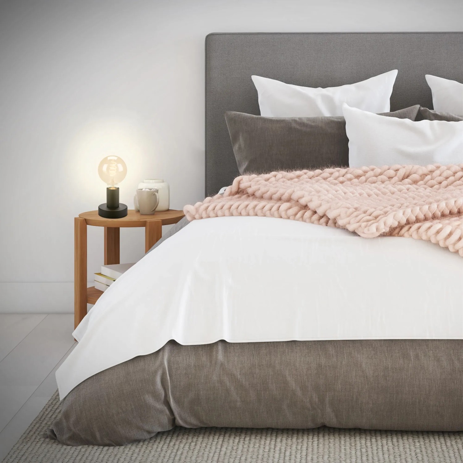 Brilo Tischleuchte Teepu, schwarze Designlampe mit E27 Fassung auf Nachttisch.