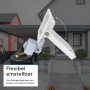 Flexibel einstellbarer, weißer LUXULA LED Strahler mit Bewegungsmelder für den Außenbereich.