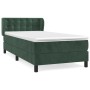 Dunkelgrünes Boxspringbett mit Matratze und Kopfteil (90x200 cm) aus Samt.