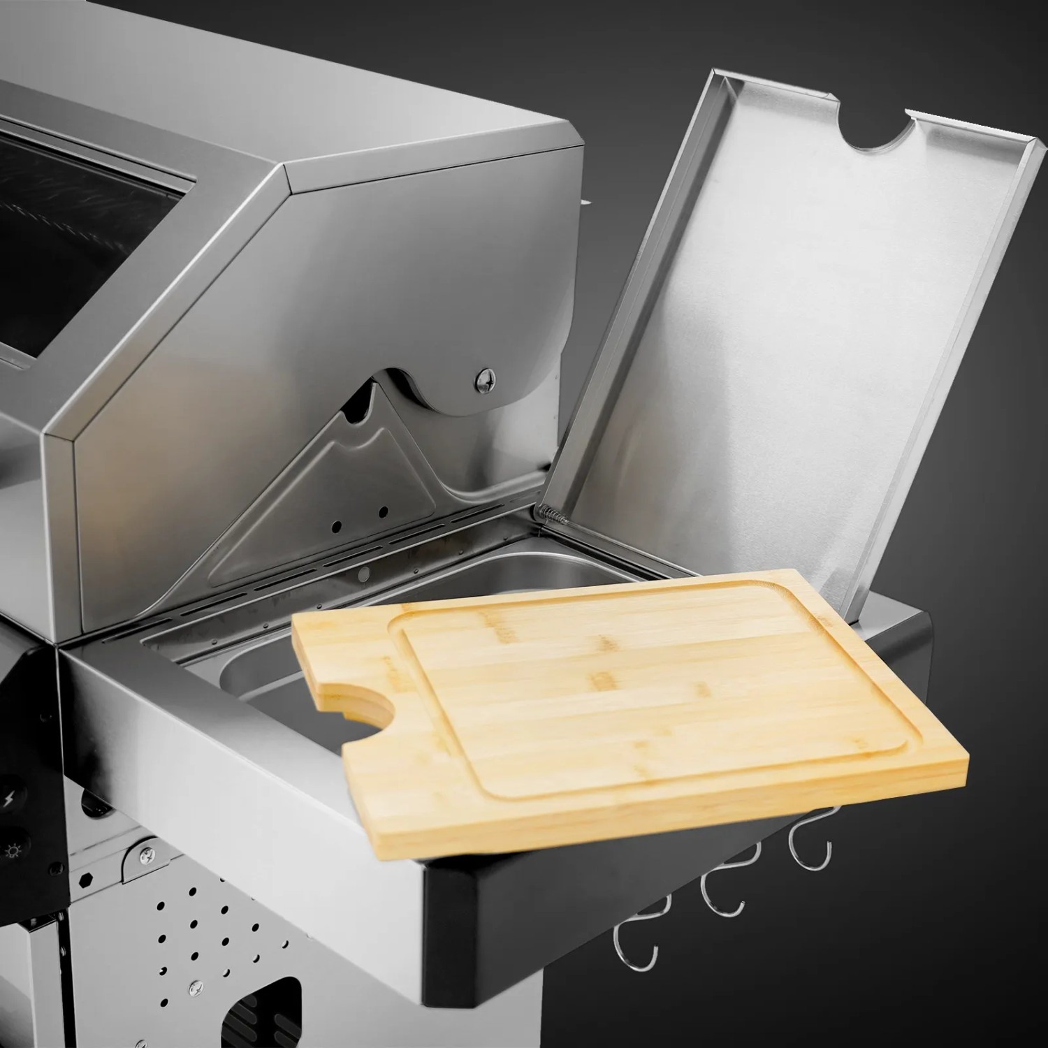 Detailaufnahme: Taino Platinum Yamara Gasgrill mit Schneidebrett und Seitenbrenner.