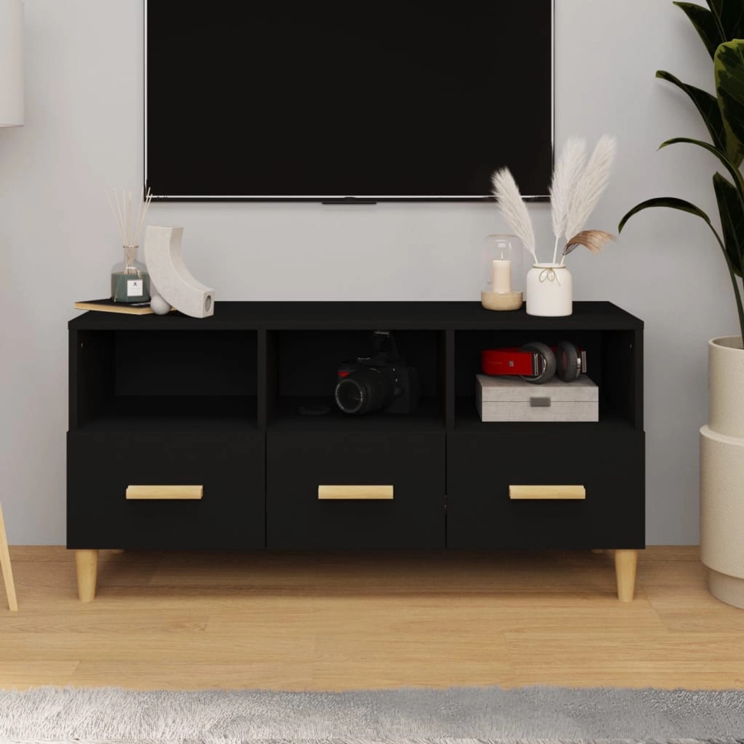 Schwarzer VidaXL TV-Schrank (102x36x50 cm) aus Holzwerkstoff mit Fächern und Schubladen.