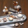 Glorex Gießform Teelichthalter (6/7cm) mit Deko-Elementen wie Muscheln und Holzstücken.