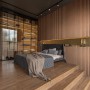 Schlafzimmer mit Marburg Vliestapete Akustikpaneel in Kupfer-Metalloptik.