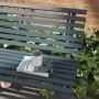Blaue Outsunny Gartenbank aus Aluminium mit Buch und Tasse auf der Sitzfläche.