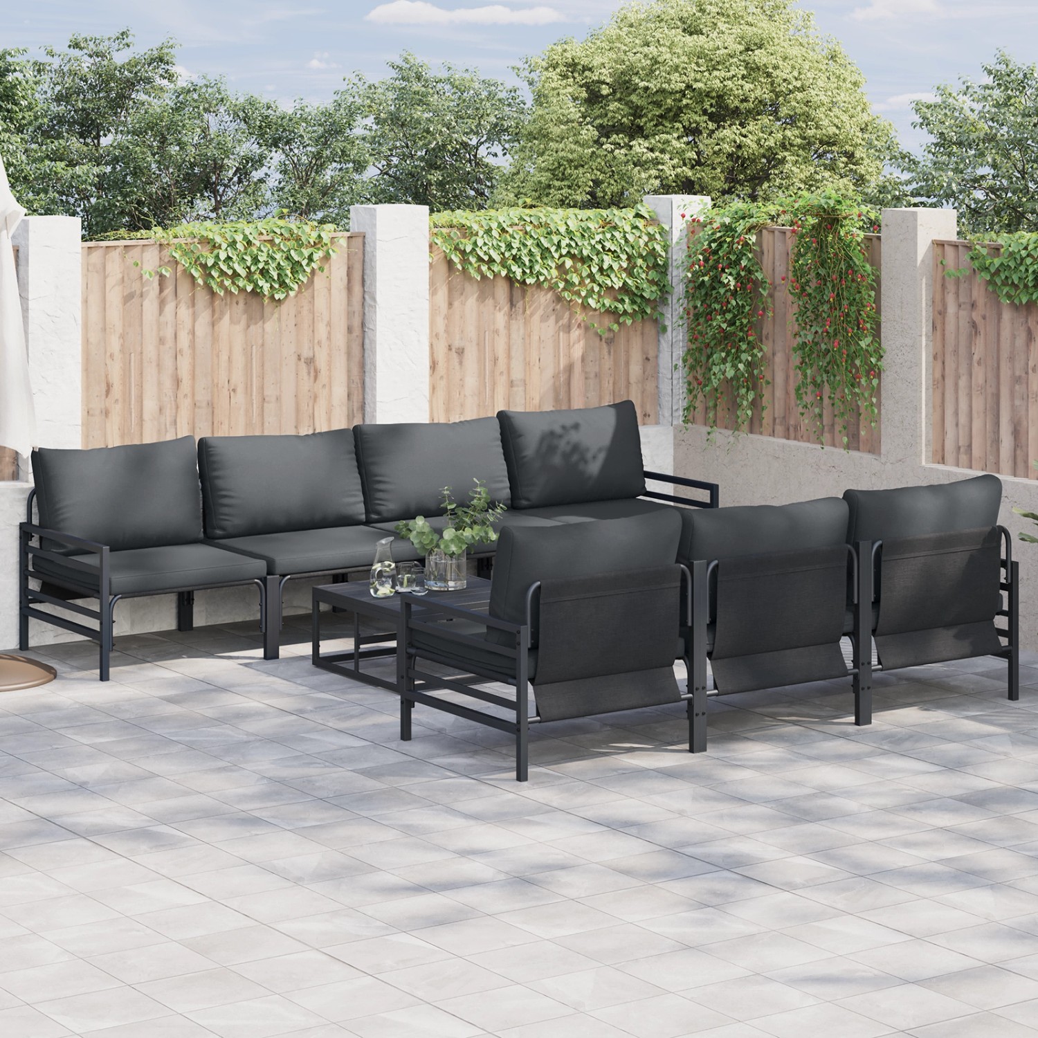 Anthrazitfarbenes 8-teiliges Garten-Sofa-Set mit Stahlrahmen und Gewebekissen.