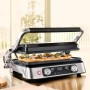Braun Multigrill 9 Pro Kontaktgrill in Silber mit Pizza im geöffneten Zustand.