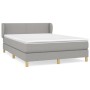 Hellgraues vidaXL Boxspringbett 140x190 cm mit Matratze und Stoffbezug.