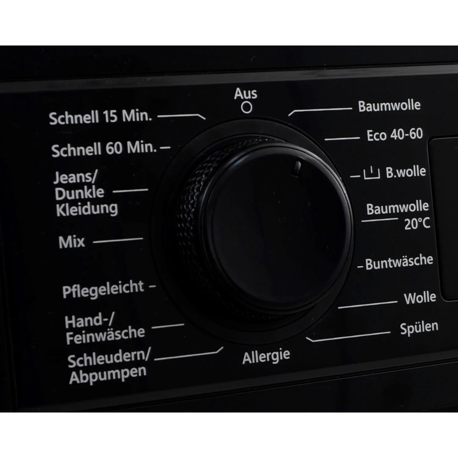 Detailaufnahme: Programmwahlknopf der schwarzen Telefunken Waschmaschine mit verschiedenen Waschprogrammen.