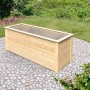 Naturbelassenes Karibu Hochbeet aus Fichte, 92x244x94 cm, auf Steinen im Garten.