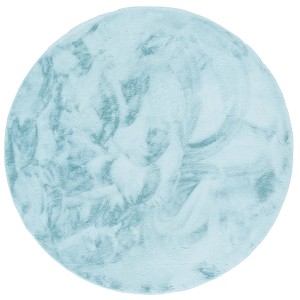 Runder, türkisfarbener Fellteppich (80x80cm) von Pergamon, super soft und luxuriös.