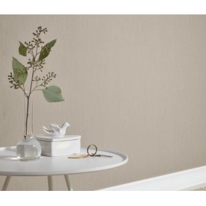 Erismann Vliestapete Guido Maria Kretschmer Uni Taupe an Wand, mit Tischdeko.