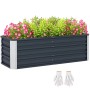 Outsunny Gartenbeet aus Stahl, kohlegrau, mit Blumen und Gartenhandschuhen.