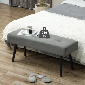Graue HOMCOM Sitzbank mit Cordbezug, getuftet, 100x36x45 cm, vor Bett.