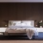Schlafzimmer mit Akustikpaneel Walnuss geölt als Wandverkleidung.