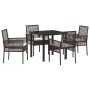 5-teiliges Garten Esszimmer Set aus braunem Rattan mit Tisch, 4 Stühlen und Kissen.