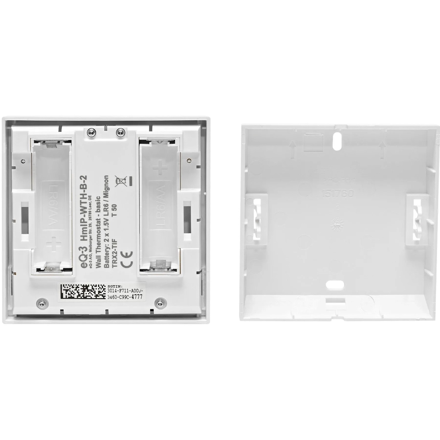 Rückseite des Homematic IP Wandthermostat Basic mit offenem Batteriefach und separater Montageplatte für einfache Installation.