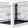 Weiße Hundebox Indoor mit Tischoberfläche und schwarzem Gitter.